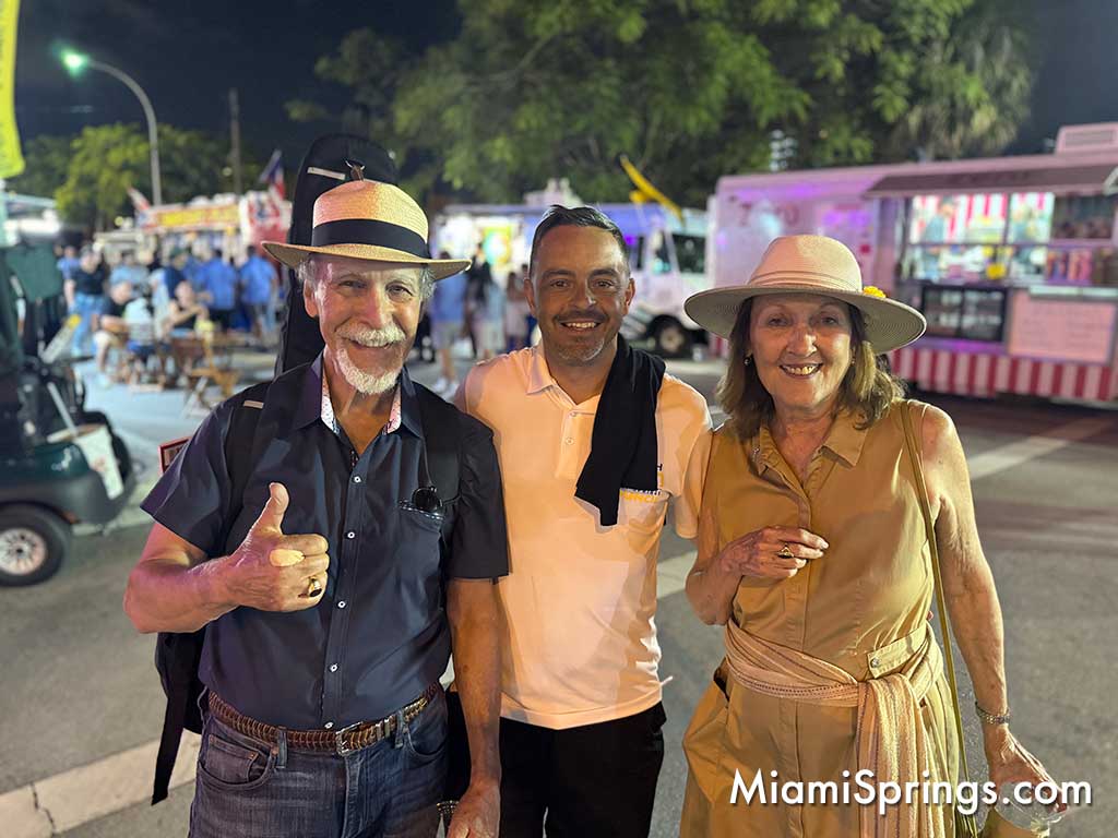 Buzz Fleischman, Councilman Joseph Dion, and Kathleen Fleischman at the 2025 River Cities Festival (Photo credit: MiamiSprings.com)