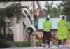 CRASH:  SUV Dangling from Miami Springs Parking Garage