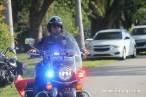 Miami Springs Police Motorman Assisting the SebastianStrong 5k Race