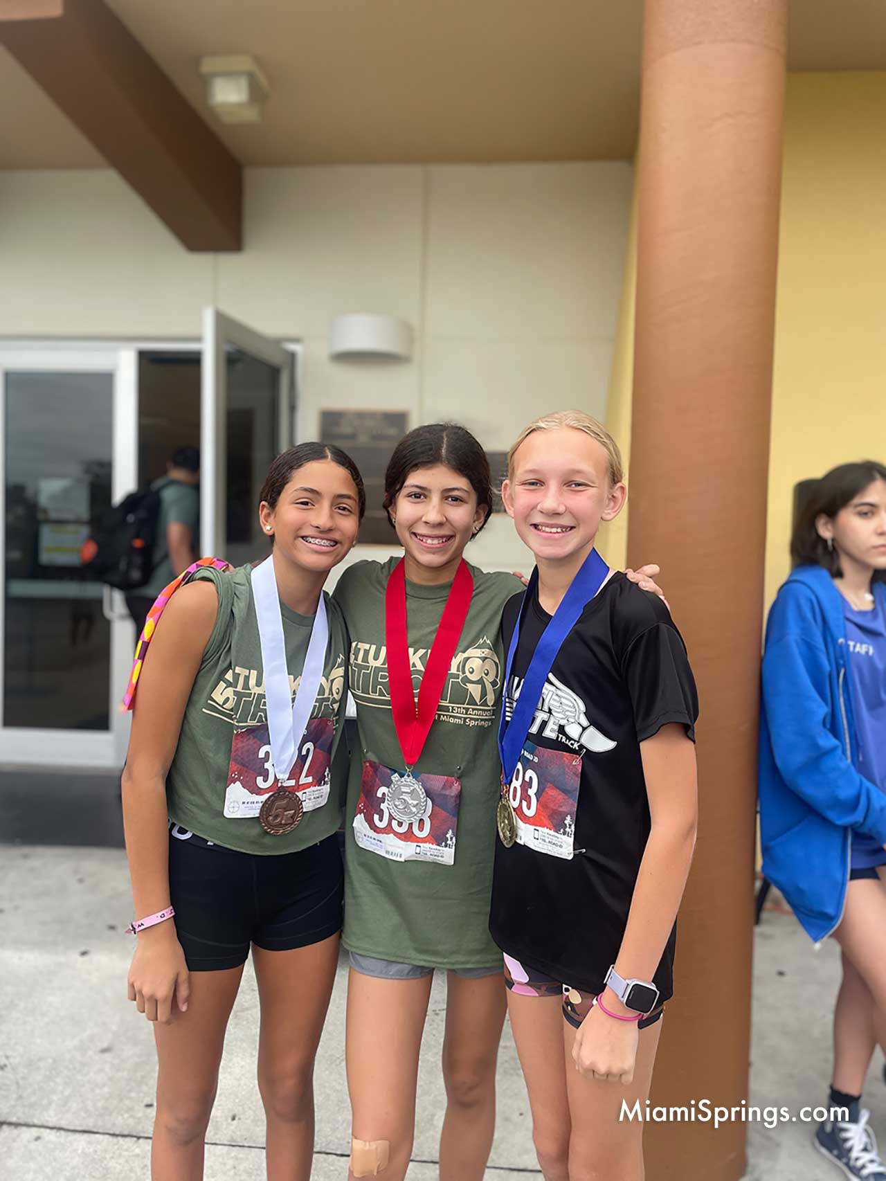 Ava Barrera, Emily Veiguela, and Kristen Rodriguez at the 2022 Miami Springs Turkey Trot