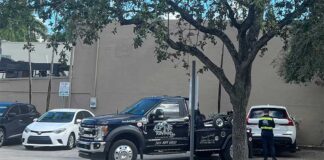 Lack of Parking brings Towing Enforcement Alpine Towing at Truist Bank - Photo Credit Jorge Santin