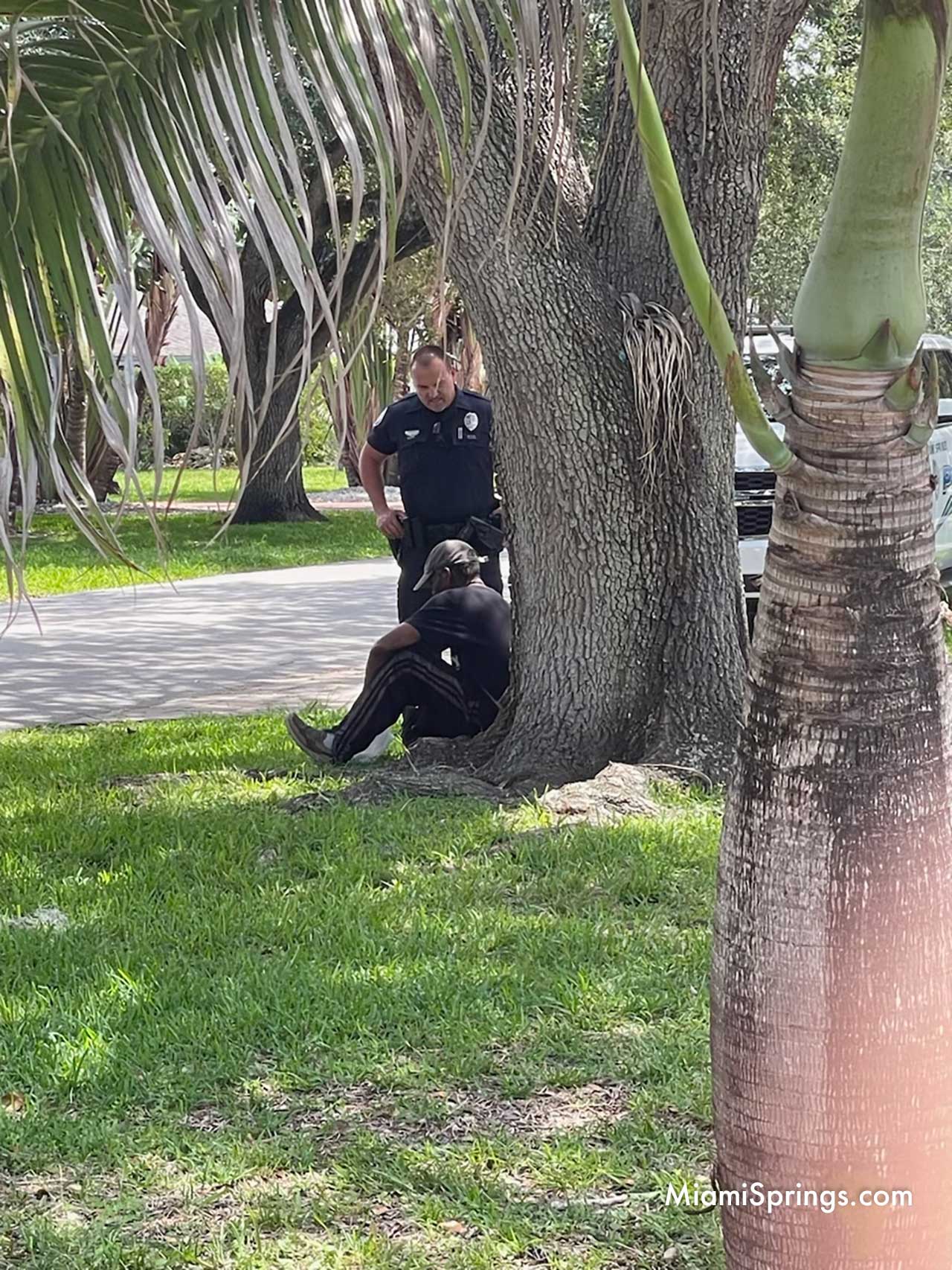 Miami Springs Police responding to a vagrant in the residential bird section.