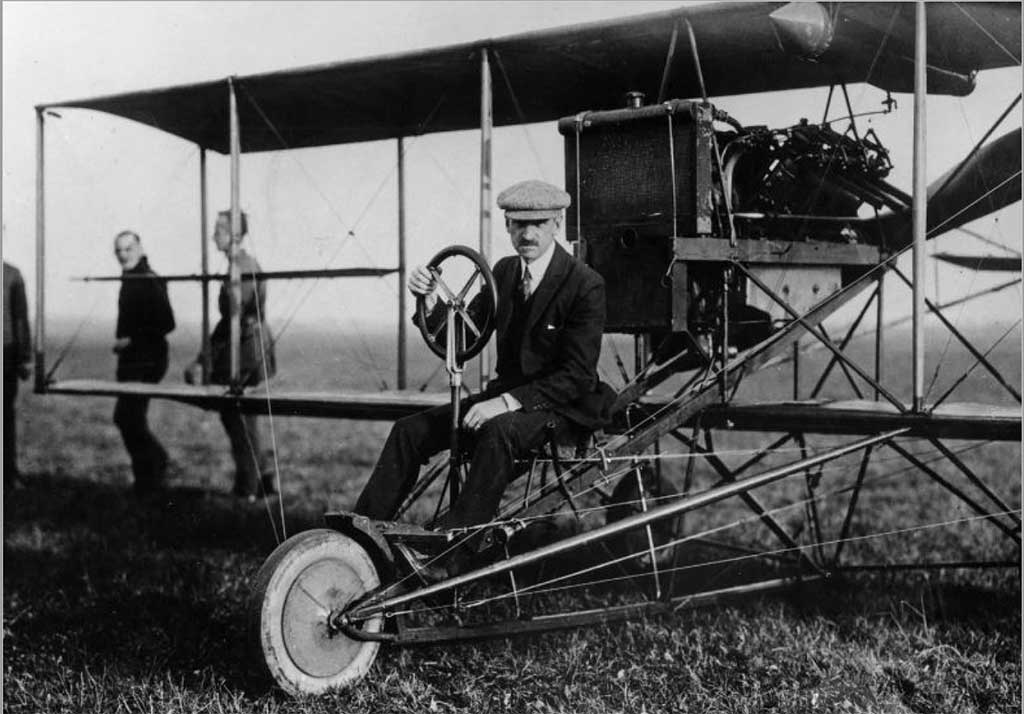 Glenn Curtiss atop the June Bug Flyer (the first public flight over 1km)