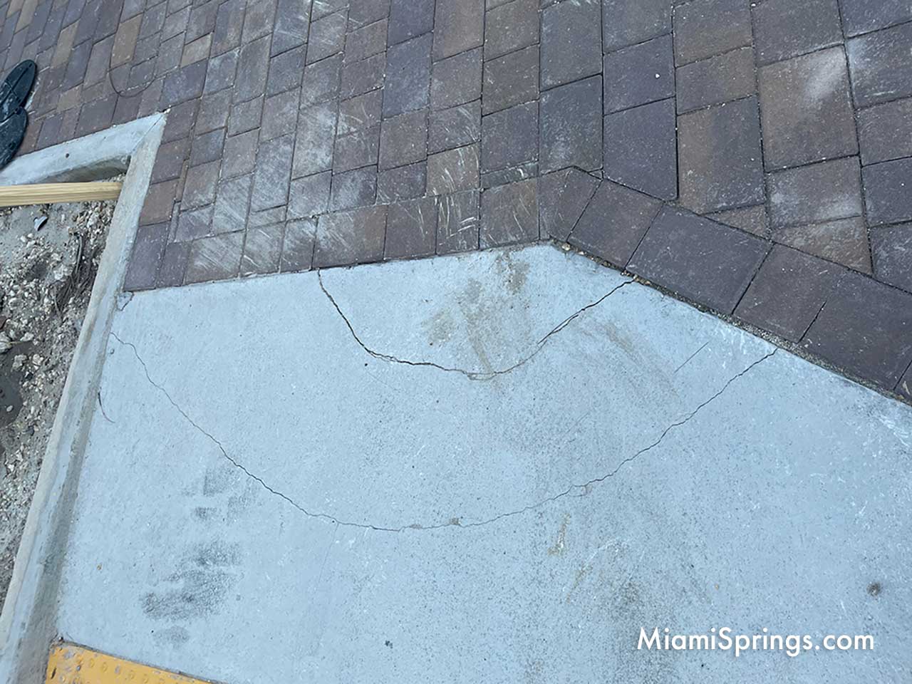 Cracked concrete sidewalk at the Miami Springs Town Center located at One Curtiss Parkway, Miami Springs, Florida (Photo Credit: MiamiSprings.com)