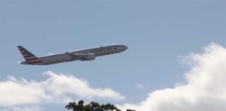 Living So Close to an Airport American Airlines Jet taking off from Miami International Airport as viewed from Miami Springs, Florida