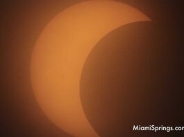 Solar Eclipse Caught in Springs despite Cloud Cover Solar Eclipse over Miami Springs