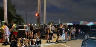 Residents, Council Respond to Factory Town’s Halloween Bass Pounding Factory Town revelers waiting for a ride in Hialeah