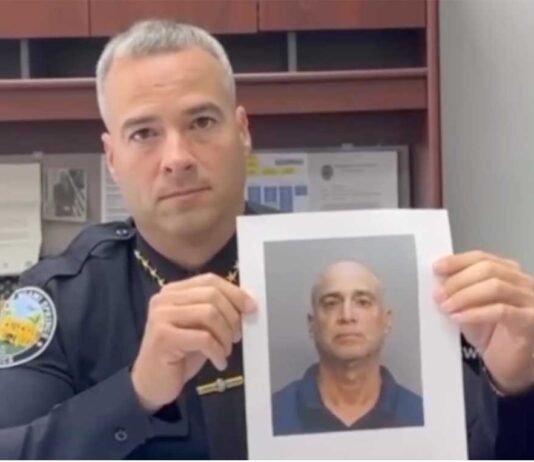 Opinion: Immigration Arrests by MSPD a Byproduct of Good Police Work Police Chief Castillo with a Picture of Julio Mesa