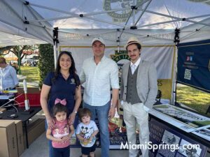 Miami-Dade Countyy Commissioner, Natalie Orbis, with her family at the Glenn Curtiss Vintage Motorcycle and Classic Car Show in Miami Springs Nov 1, 2025