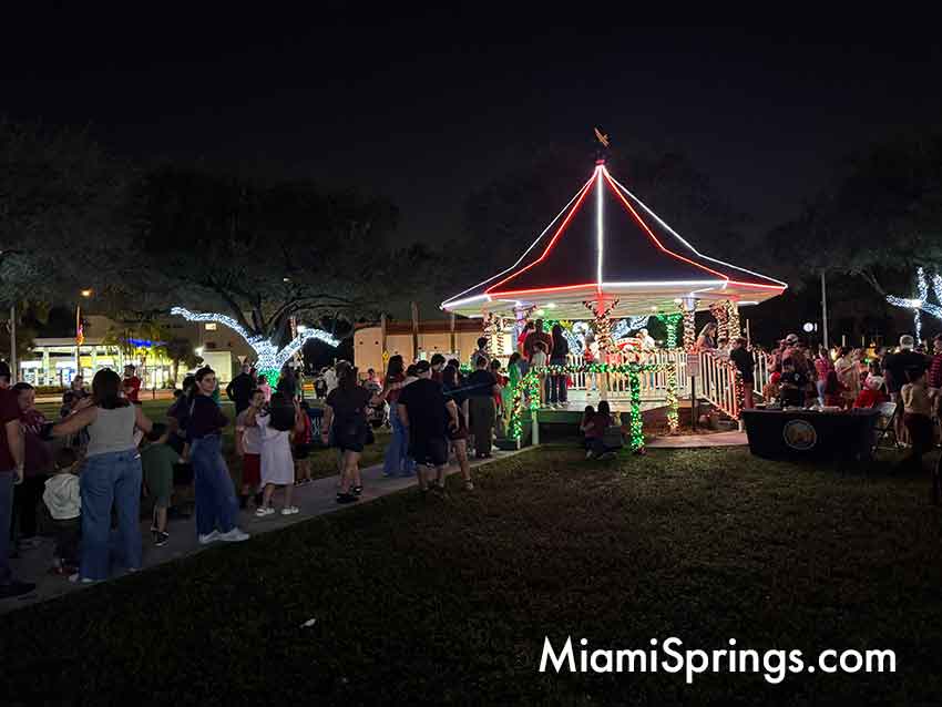 Line of residents waiting to take their picture with Santa at the Gazebo