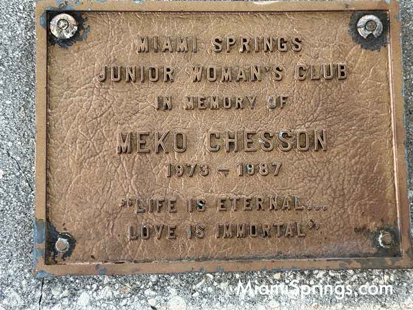 Meko Chesson Memorial outside the Miami Springs Library inside the Imogene Post Bird & Butterfly Garden