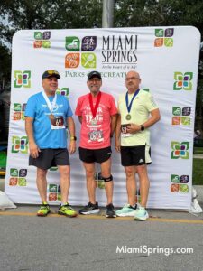 Felix Murillo (62 left), Jose Alberto Torres (56 center), and Erik Manzano (57 right) at the River Cities Regatta 5K Run