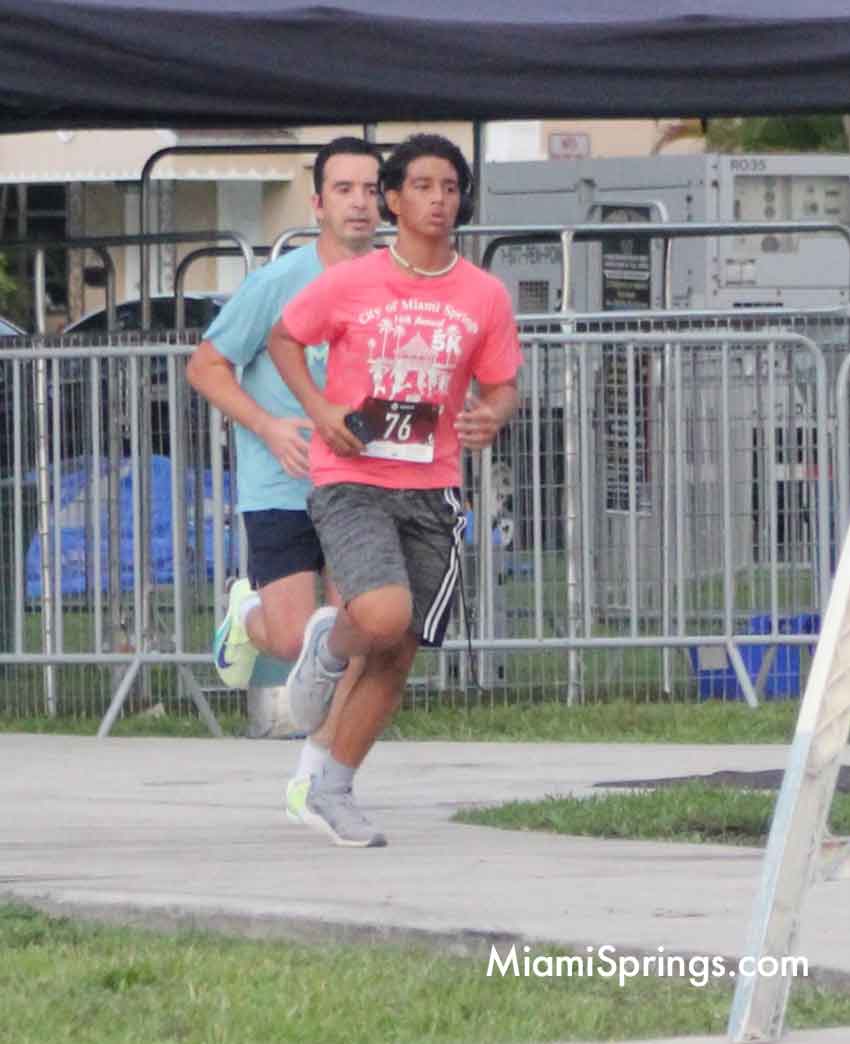 Lester Rangel (40 Blue Shirt) and Alejandro Quirantes (14 Peach Shirt) at the River Cities Regatta 5K Run
