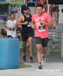 Jayda Jagessar (14 left), Jean Rivas (35 center), and Roger Hulse (19 right) at the River Cities Regatta 5K Run