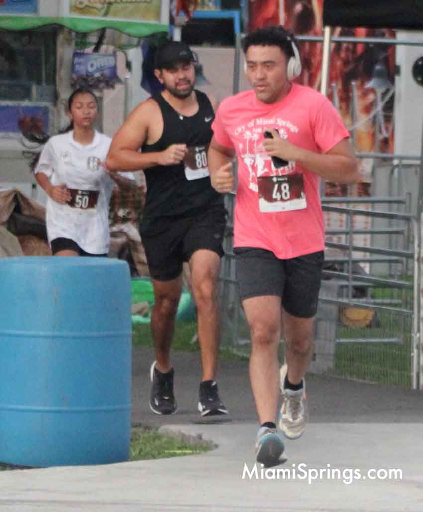 Jayda Jagessar (14 left), Jean Rivas (35 center), and Roger Hulse (19 right) at the River Cities Regatta 5K Run