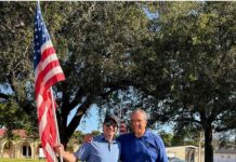 Rotary Club Decorates Curtiss Parkway with American Flags Rotary Club Decorating Curtiss Parkway with American Flag (Photo Credit: Jorge Santin)