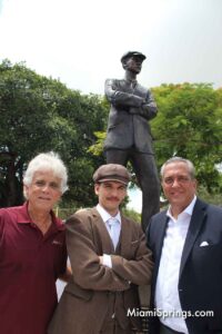 Former Miami Springs Councilman Jaime Petralanda (left), Glenn Curtiss impersonator (center) and Current Councilman Jorge Santin (right)