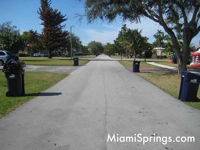 Ugly Miami Springs: Recycling Bins makes Miami Springs look ugly. If we have an alleyway, why not put the recycling bins in the alley?