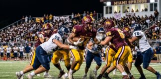 Golden Hawks Soar Past Conchs in Thrilling 14-10 District Battle